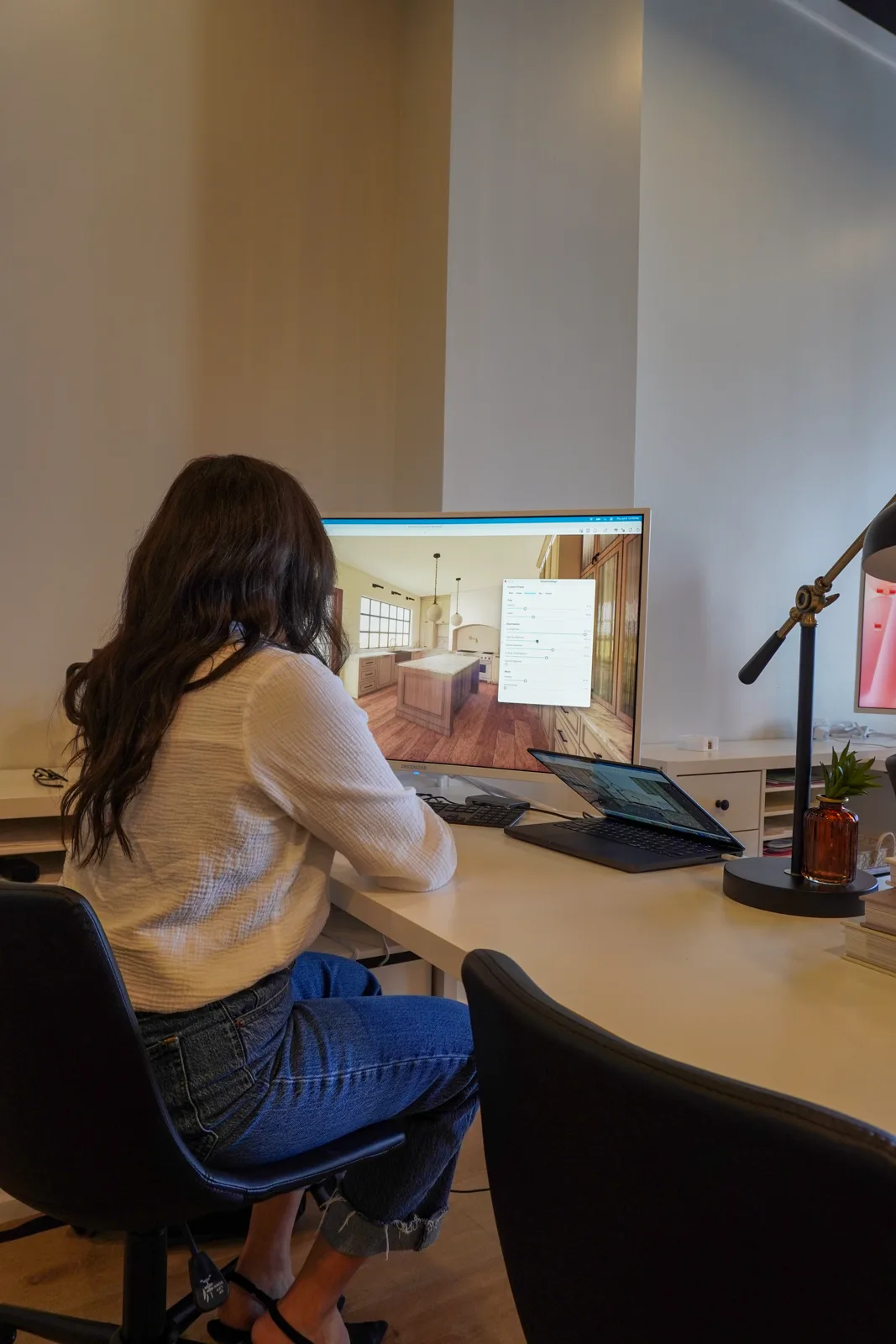 Sonia, Interior Designer at Provision Design Build, working on a kitchen design